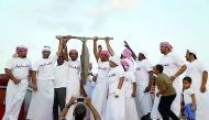 Competitors display their catch at the last edition of the annual Senyar Championship in Katara. This year's contest starts on April 13 with over 1,100 contestants.