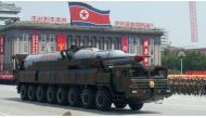 © Ed Jones / AFP | A North Korean Taepodong-class missile is displayed during a military parade past Kim Il-Sung square marking the 60th anniversary of the Korean war armistice in Pyongyang on July 27, 2013.