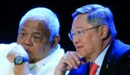 Philippine Finance Secretary Carlos Dominguez (R) with Executive Secretary Salvador Medialdea during a 