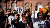 Members of the human rights group Madres de Plaza de Mayo (Mothers of the Disappeared) shout slogans during commemorations of the 40th anniversary of their first march to demand justice for their children, who went missing during Argentina's 1976-1983 mil