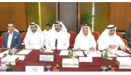 Mohammed bin Ahmed bin Towar Al Kuwari (third left), Vice Chairman, Qatar Chamber; and  Rami Bouchaib (left),  Chairman, CIME along with other officials at the business meeting, yesterday. Pic / Syed Omar