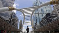 FILE PHOTO: A man walks in business area in Bangkok, Thailand, May 22, 2015. REUTERS/Chaiwat Subprasom/File Photo.