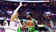 Jaylen Brown (70 of the Boston Celtics drives against Kyle Korver (26) of the Cleveland Cavaliers during Game Three of their 2017 NBA Eastern Conference Finals at Quicken Loans Arena in Cleveland, Ohio
