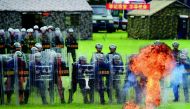 Chinese paramilitary police officers who serve on the border between Hong Kong and Guangdong province taking part in anti-riot training exercises in Shenzhen, in China's Guangdong province, yesterday.