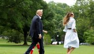 US President Donald Trump with first lady Melania and their son Barron walk on the South Lawn of the White House in Washington, U.S., before their departure to Camp David, June 17, 2017. (REUTERS/Yuri Gripas)