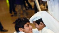 A social media influencer Ghanim Al Muftah (left) welcomes a visitor at HIA yesterday.