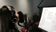 Maizurah recording the song at the Abbey Road Studios.