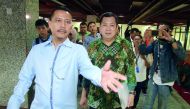 Hary Tanoesoedibjo (centre), a media and property mogul who is building two Trump Organisation projects, arrives at police special crime unit office in Jakarta, yesterday. US President Donald Trump's Indonesian business partner has been questioned by poli