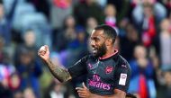 Arsenal player Alexandre Lacazette (left) celebrates after scoring his first goal for Arsenal in his first match during their football friendly against Sydney FC played in Sydney.
