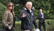 US President Donald Trump and First Lady Melania Trump depart the White House in Washington, DC, on August 29, 2017 for Texas to view the damage caused by Hurricane Harvey. / AFP / Nicholas Kamm