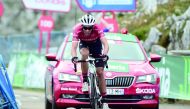 Trek Segafredo's Spanish cyclist Alberto Contador arrives at the finish line winning the 20th stage of the 72nd edition of 