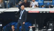 Real Madrid's coach from France Zinedine Zidane gestures during the Spanish league football match Real Madrid CF against Real Betis at the Santiago Bernabeu stadium in Madrid on September 20, 2017. / AFP / GABRIEL BOUYS
