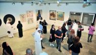Visitors at the opening of ‘Reflection’ exhibition which marked the launch of Al Markhiya Gallery at Fire Station yesterday. Pic: Baher Amin / The Peninsula
