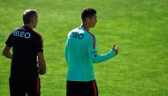 Portugal's forward Cristiano Ronaldo (R). AFP / FRANCISCO LEONG

