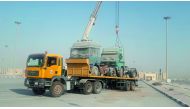 Abandoned trucks are being removed at Al Wakrah.