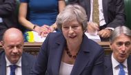 A still image taken from footage broadcast by the UK Parliament's Parliamentary Recording Unit (PRU) shows Britain's Prime Minister Theresa May as she speaks during the weekly Prime Minister's Questions (PMQs) session in the House of Commons in London on 