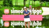Cristie Kerr of the US holding the trophy after winning the LPGA Malaysia in Kuala Lumpur yesterday.