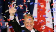 Democratic Alabama US Senate candidate Doug Jones acknowledges supporters at the election night party in Birmingham, Alabama, US, December 12, 2017. REUTERS/Marvin Gentry 