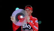 FILE PHOTO: Team Sky rider Chris Froome of Britain celebrates on the podium after winning the Vuelta Tour of Spain after the last stage of the cycling race between Arroyomolinos and Madrid, September 10, 2017. REUTERS/Susana Vera/File Photo
