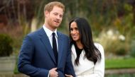 An image of Britain's Prince Harry poses with Meghan Markle in the Sunken Garden of Kensington Palace, London, Britain, November 27, 2017. REUTERS/Toby Melville