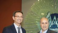 Aspire Academy’s Director General, Ivan Bravo (left) presents a memento to Football Federation of Islamic Republic of Iran (FFIRI) President Mehdi Taj.