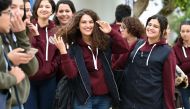 A file photo of Siwar Tebourbi (C), an 18-year-old Tunisian schoolgirl, walking with colleagues as they leave school in Bizerte on November 30, 2017. / AFP / FETHI BELAID