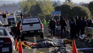 Picture shows dead bodies at an accident when a car crashed into a vehicle transporting pilgrims on the outskirts of Puebla, Mexico December 12, 2017. — Reuters pic.