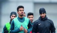 Akram Afif (foreground) eyes third spot for Qatar at AFC U23 Championship in China.