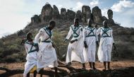 Pokot tribe teen age girls, who don't practice female genital mutilation (FGM), pose in church uniform at Katabok village in the northeast of Uganda, on January 30, 2018. AFP / Yasuyoshi Chiba
