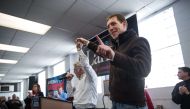UMWA President Cecil Roberts (L) and Conor Lamb, Democratic Congressional candidate for Pennsylvania's 18th district, gesture at a campaign rally with United Mine Workers of America (UMWA) at the Greene County Fairgrounds, March 11, 2018 in Waynesburg, Pe