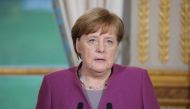 German Chancellor Angela Merkel gives a joint press conference with France's President at the Eylsee presidential Palace in Paris, France March 16, 2018. Ludovic Marin/Pool via REUTERS
