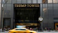 People gather outside the 5th Avenue entrance to Trump Tower in New York City, April 10, 2018. Reuters/Brendan McDermid