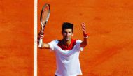 Serbia's Novak Djokovic acknowledges applause as he celebrates defeating compatriot Dusan Lajovic during their round of 64 tennis match at the Monte-Carlo ATP Masters Series Tournament, on April 16, 2018 in Monaco.  AFP / Valery Hache