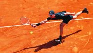 Austria's Dominic Thiem returns the ball to Russia's Andrey Rublev during their tennis match as part of the Monte-Carlo ATP Masters Series Tournament, on April 17, 2018 in Monaco. AFP / Valery Hache