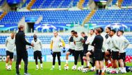 Liverpool manager Juergen Klopp speaks to players during training Action Images via Reuters/John Sibley