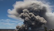 Ash plume rises following a massive Volcano eruption on Kilauea Volcano in Hawaii, United States on May 17, 2018. Lava is spewing more than 60 metres into the air and spread around 36,000 square metres. ( USGS / Handout - Anadolu Agency )
 

Ash plume 