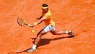 Spain's Rafael Nadal returns the ball to Italy's Fabio Fognini during Rome's ATP Tennis Open tournament at the Foro Italico, on May 18, 2018 in Rome. AFP / Andreas Solaro