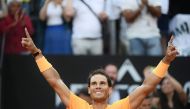 Spain's Rafael Nadal celebrates after winning the Men's final against Germany's Alexander Zverev at Rome's ATP Tennis Open tournament at the Foro Italico, on May 20, 2018 in Rome. / AFP / Filippo MONTEFORTE