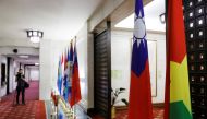 Flags of Taiwan (2nd-R) and Burkina Faso (R) are seen inside Taiwan's Ministry of Foreign Affairs in Taipei, Taiwan on May 24, 2018. REUTERS/Tyrone Siu