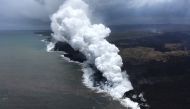 An aerial view looking west, of the two active ocean entries at Kilauea Volcano's lower East Rift Zone in Hawaii, U.S. May 26, 2018. USGS/Handout via REUTERS