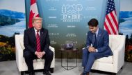 Canada's Prime Minister Justin Trudeau (R) meets with U.S. President Donald Trump during the G7 Summit in the Charlevoix town of La Malbaie, Quebec, Canada, June 8, 2018. (REUTERS/Christinne Muschi)