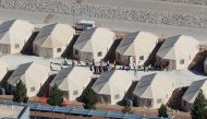 Immigrant children, many of whom have been separated from their parents under a new 