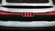 FILE PHOTO: Audi sign is seen on the show car at the Audi Forum before the company's annual shareholders meeting in Ingolstadt, Germany May 9, 2018. REUTERS/Michael Dalder
