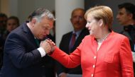 German Chancellor Angela Merkel (R) chats with Prime Minister of Hungary Viktor Orban (L) during the second day of the European Union Leaders' Summit in Brussels, Belgium on June 29, 2018. (Dursun Aydemir/Anadolu Agency)