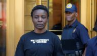 Patricia Okoumou walks out of federal court from her arraignment, a day after authorities say she scaled the stone pedestal of the Statue of Liberty to protest U.S. immigration policy, in Manhattan, New York, U.S., July 5, 2018. Reuters/Shannon Stapleton