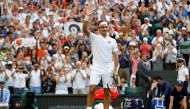 Switzerland's Roger Federer celebrates winning his third round match against Germany's Jan-Lennard Struff. REUTERS/Peter Nicholls