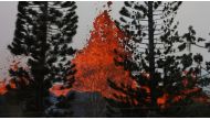 Lava from a Kilauea volcano fissure erupts on Hawaiis Big Island on May 19, 2018 in Kapoho, Hawaii (Mario Tama / Getty Images / AFP) 