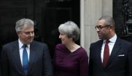 Britain's Prime Minister Theresa May poses with Brandon Lewis and James Cleverly outside 10 Downing Street, London, January 8, 2018. Reuters/Simon Dawson