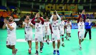 Qatar’s players celebrate after retaining their Asian Handball title in this file photo.