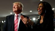 Republican presidential nominee Donald Trump and Omarosa Manigault (R) attend a church service, in Detroit, Michigan, U.S., September 3 2016. Reuters/Carlo Allegri